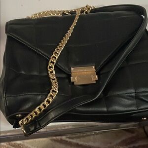Elegant Black Quilted Bag with Gold Chain